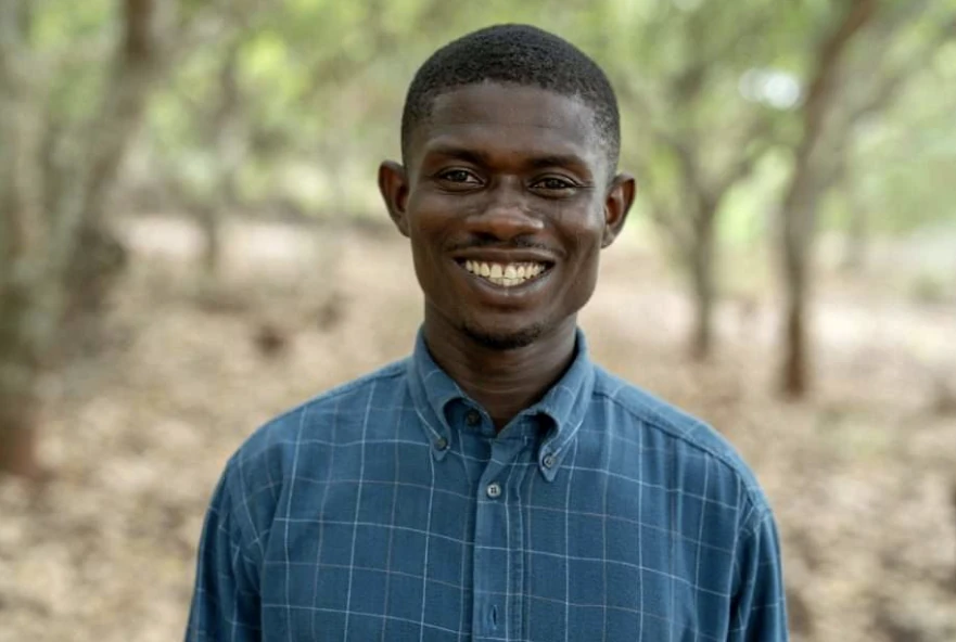 Stephen Adu among the cashew trees